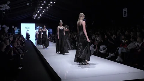 Models dressed black present jewelry by Grass during Tel Aviv Fashion Week Видео 87809560