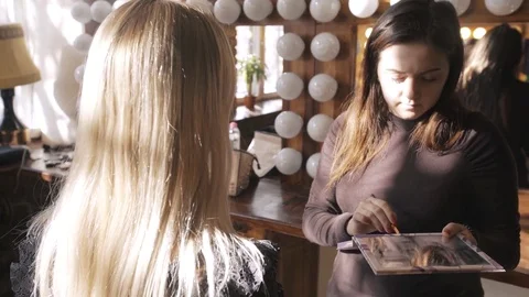 Models make up before the photo session Stock Footage 73817955