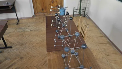Models Molecular Structures Or Crystal Lattices On The Table, Top View Stock Footage 138046361