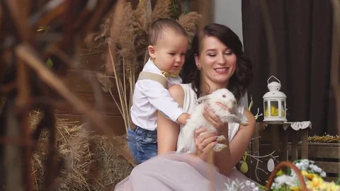 Models Mother and Son With the Easter Bunny Stock Footage 73786285