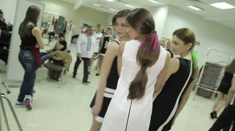 Models near mirror 1 Stock Footage 37607327