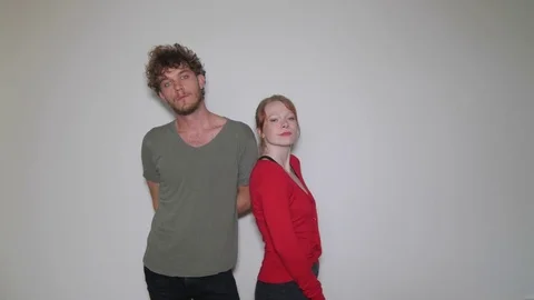 Models playing casual in studio during photo session Video stock 73539783