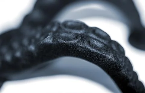 Models printed on 3D printer. Black objects printed on 3D printer made plastic Stock Photos