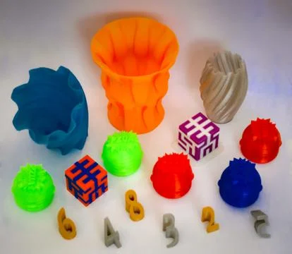 Models printed by 3d printer. Colorful objects printed 3d printer Stock Photos