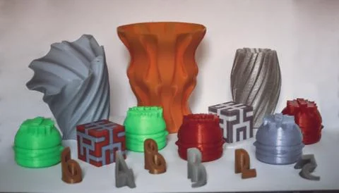 Models printed by 3d printer. Colorful objects printed 3d printer Stock Photos