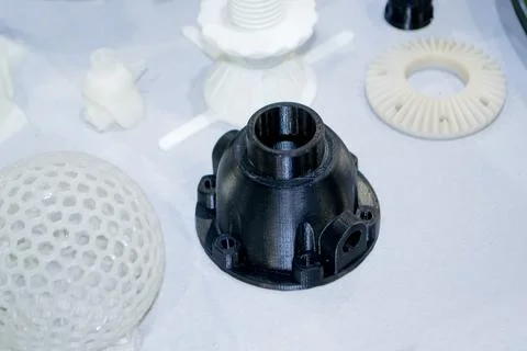 Models printed on 3D printer. Many objects printed on 3D printer made plastic Foto stock