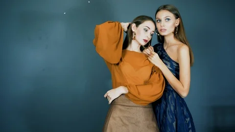 Models show new clothes, famous ladies with bright make-up and with earrings in Stock Footage 93541803