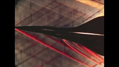 Models of the Tupolev Tu-144, a jet airliner, are tested at supersonic speeds in Stock Footage 88826261