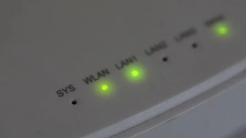Modem router server LED lights, closeup, green lights, white color, loopable Stock Footage 82629193