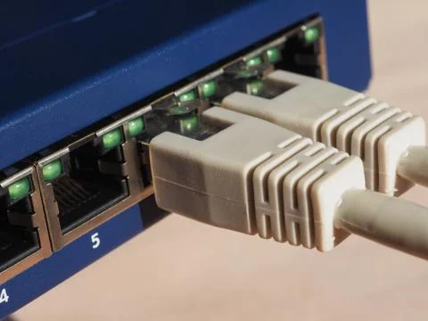 Modem router switch with RJ45 ethernet plug ports Stock Photos