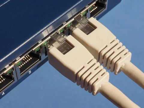 Modem router switch with RJ45 ethernet plug ports Modem router switch with... Stock Photos