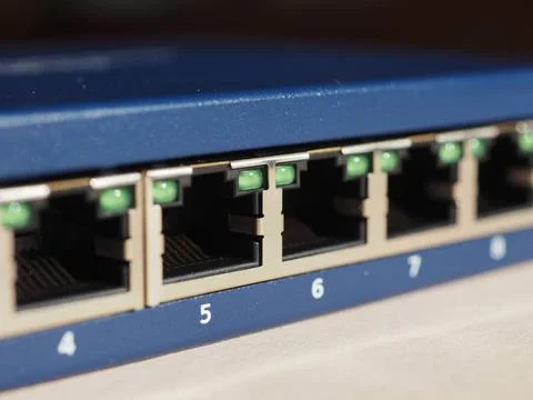 Modem router switch with RJ45 ethernet plug ports Modem router switch with... Stock Photos