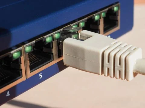Modem router switch with RJ45 ethernet plug ports Modem router switch with... Stock Photos