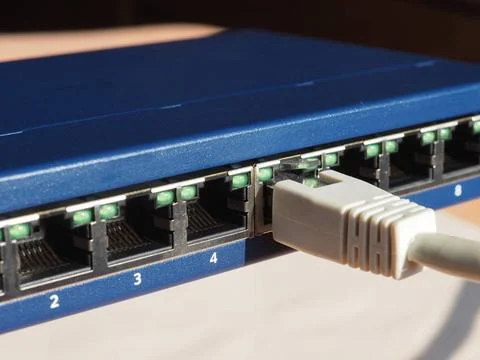 Modem router switch with RJ45 ethernet plug ports Modem router switch with... Stock Photos