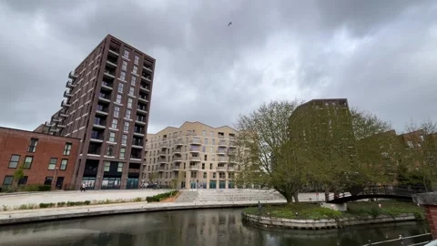 Moden flats - housing development by the river Stock-Footage 332117743