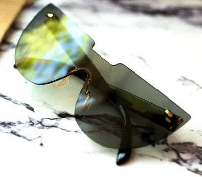 Moder sunglasses on the table Stock Photos
