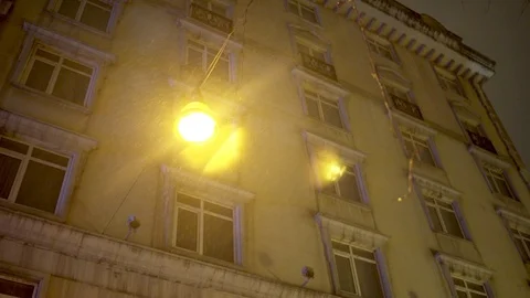 Moderate rain in front of an old building. Stock Footage 124609444