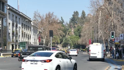 Moderate traffic and groups of people crossing Stock Footage 95914728