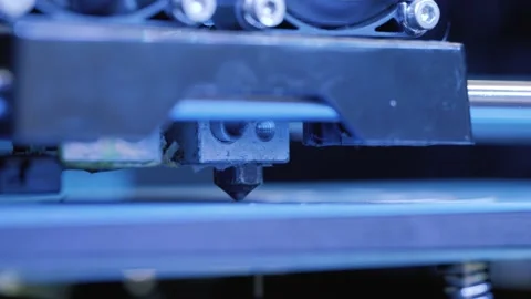 Modern 3D printer automatic printing material object. Stock Footage 157058310