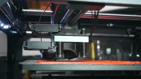 Modern 3d printer creates the first layer of the model 動画素材 89905859