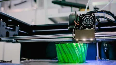 Modern 3D printer machine printing plastic model Fotos de archivo