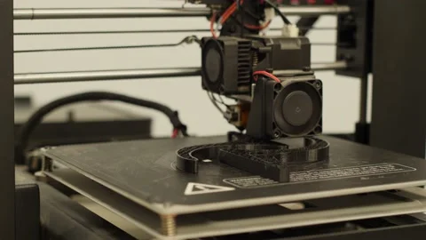 Modern 3D printer printing figure close-up macro Stock Footage 203883305