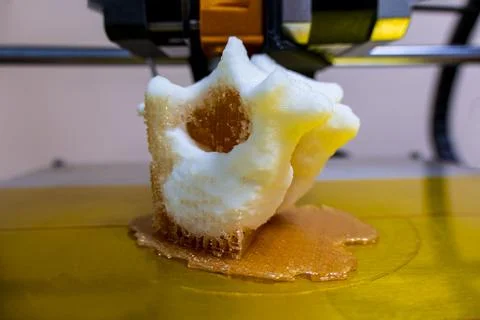Modern 3D printer printing figure close-up macro 3d printer prints a vertebra Stock Photos