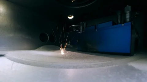 Modern 3D printer printing an object from the metal powder. Stock Footage 99816697
