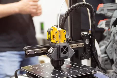 Modern 3D printer printing plastic product Stock Photos