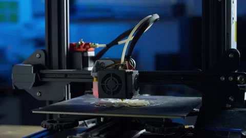 Modern 3D printer produces plastic prototype in advanced manufacturing workspace Stock Footage 329110362