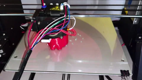 A modern 3D printer at work. Macro photography of a CNC machine that independent Stock Footage 140012082