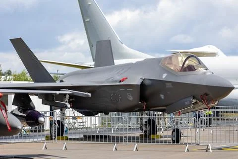 Modern 5th generation stealth fighter jet airfield sleek aerodynamic nose tra 写真素材