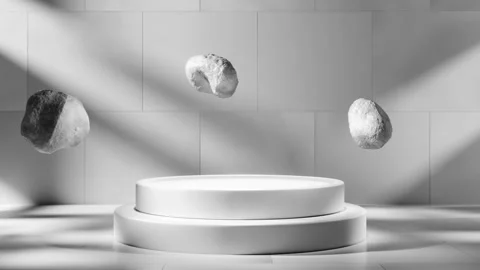 A modern abstract arrangement featuring floating rocks and a sleek, minimalist Stock Footage 278762733