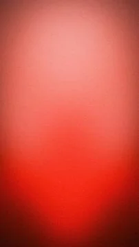 Modern abstract grainy gradient background with vibrant red and soft pink s.. Stock Photos