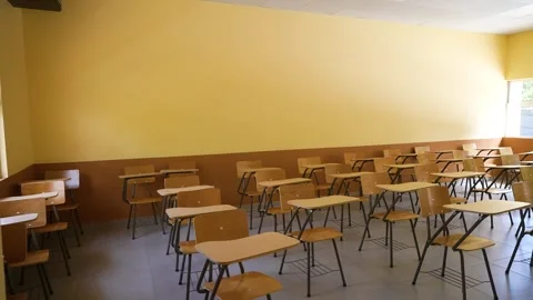 Modern academic classroom with organized desks in educational facility Stock Footage 336467534