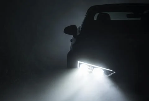 Modern Active Car LED Headlights Performing in Fog Stock Photos