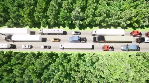 Modern aerial view of a huge queue of traffic jam from trucks Stock Footage 161694937