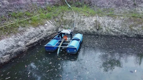 Modern agricultural pumping system with a floating platform designed to maintain Stock Footage 347795103