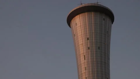 Modern air traffic control tower against twilight sky at Ben Gurion Airport Stock Footage 344744838