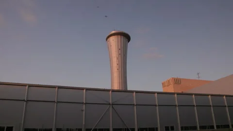 Modern air traffic control tower against twilight sky at Ben Gurion Airport Stock Footage 344744887