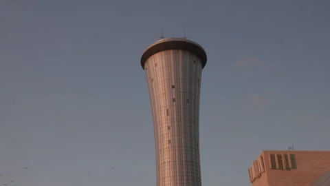Modern air traffic control tower against twilight sky at Ben Gurion Airport Stock Footage 344745007