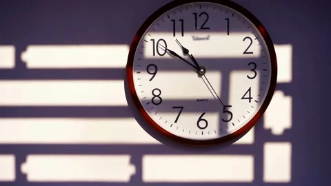 Modern alarm clock wall watch with black hands movement go forward clockwis.. Stock Footage 272761283