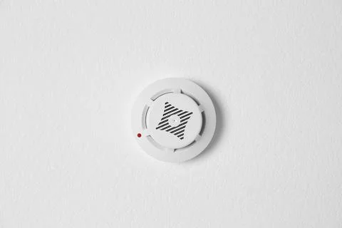Modern alarm security system hanging on ceiling Stock Photos