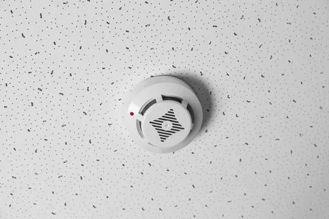 Modern alarm security system hanging on ceiling Stock Photos