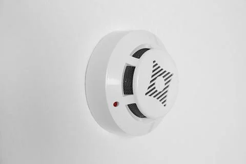 Modern alarm security system hanging on ceiling Stock Photos