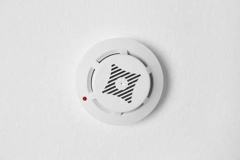 Modern alarm security system hanging on ceiling Stock Photos