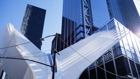 Modern and clean architecture being reflected during the day Stock Footage 136213325