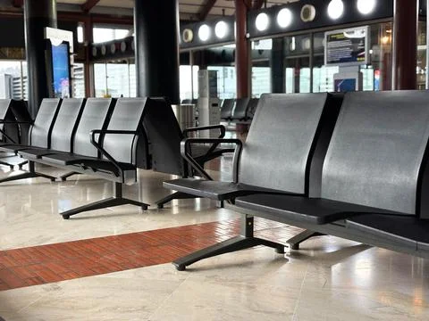 Modern and empty waiting area in a public transport terminal featuring rows Stock Photos