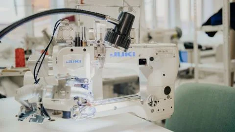 Modern and technological sewing machine backlit Stock Photos