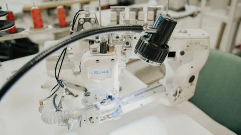 Modern and technological sewing machine backlit Stock Photos